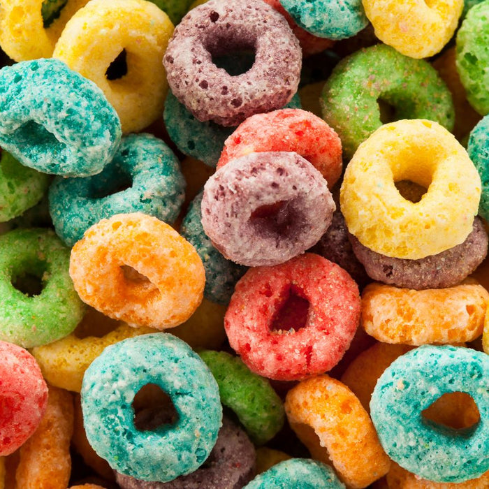 Colorful fruit-flavored cereal rings in a close-up view