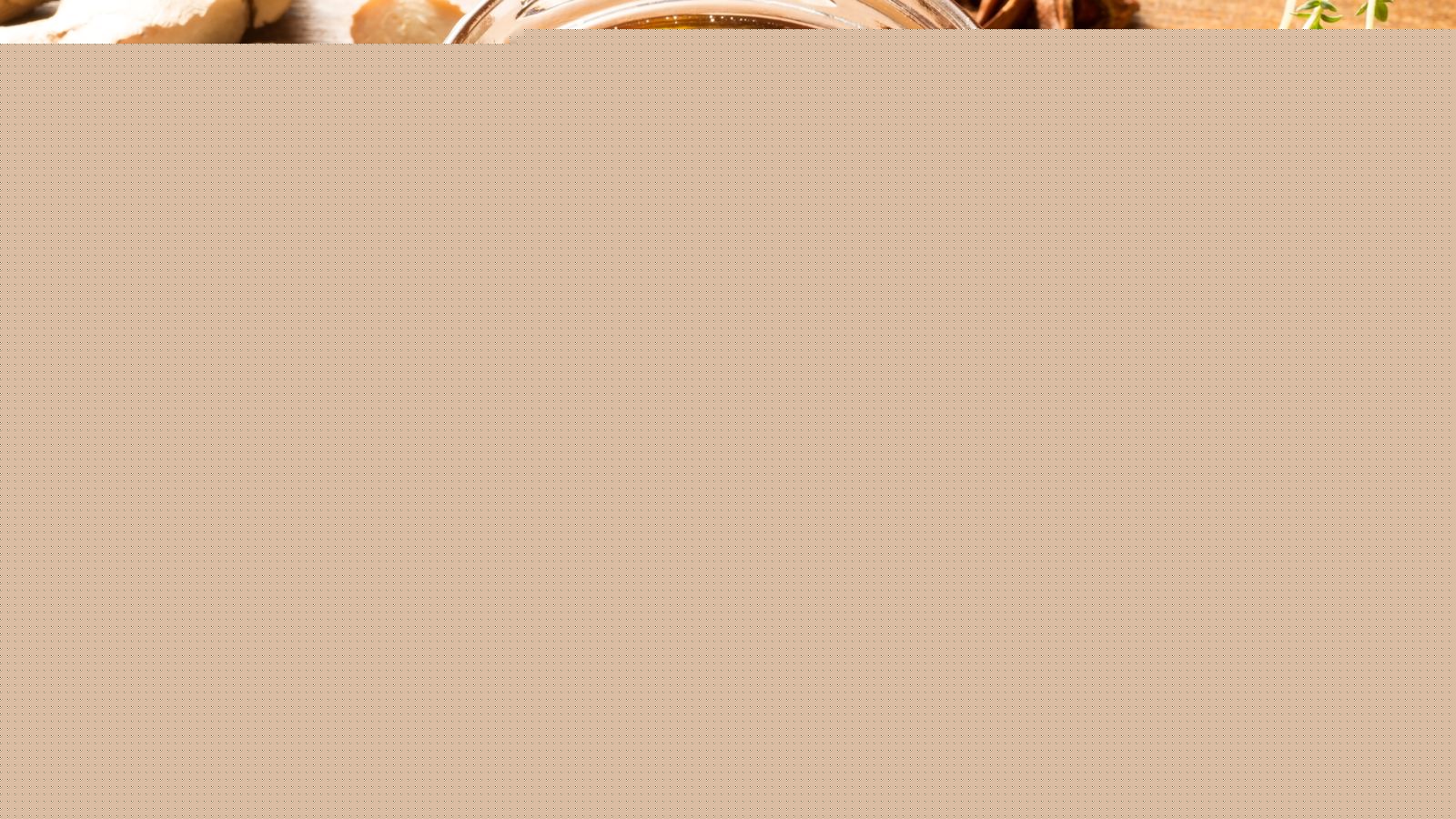 Jar of natural honey with spices like cinnamon, lemon and star anise