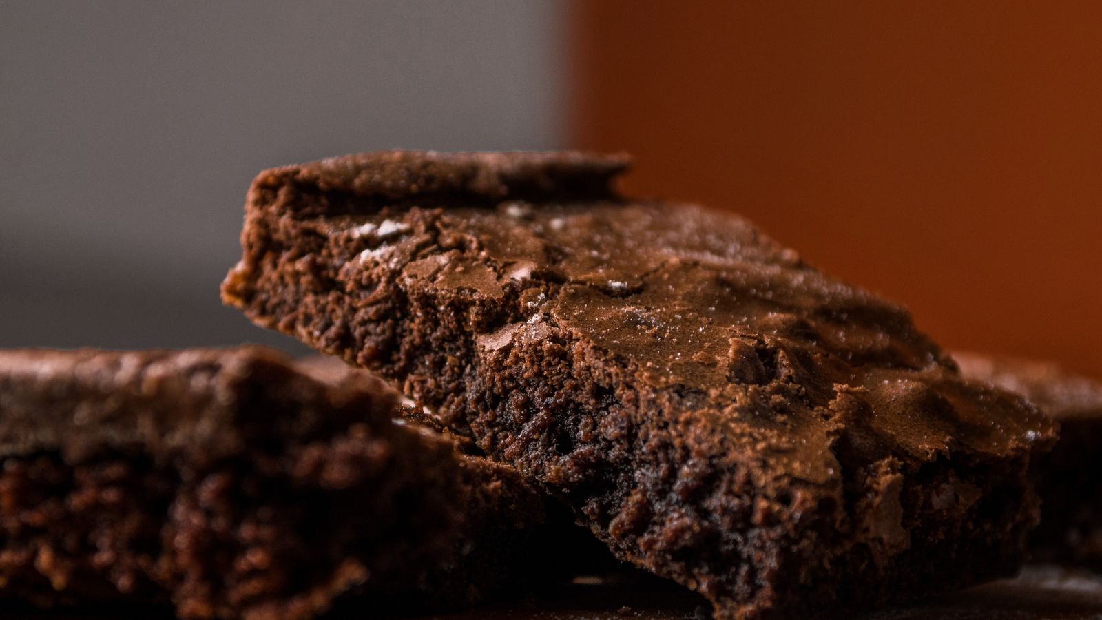 Closeup of rich fudgy brownie with crackly top layer