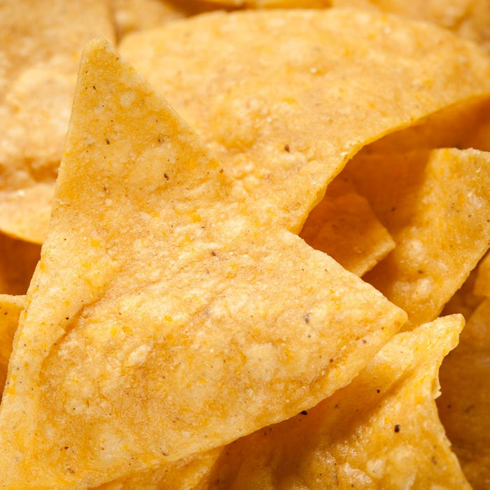 Close-up of crunchy golden tortilla chips ready to be served