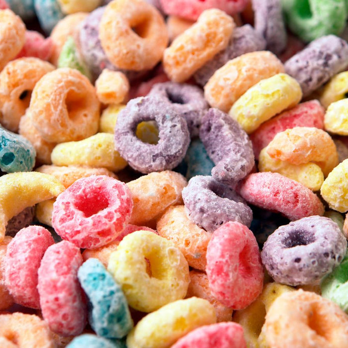 Colorful fruit cereal loops close-up in vibrant mixed colors