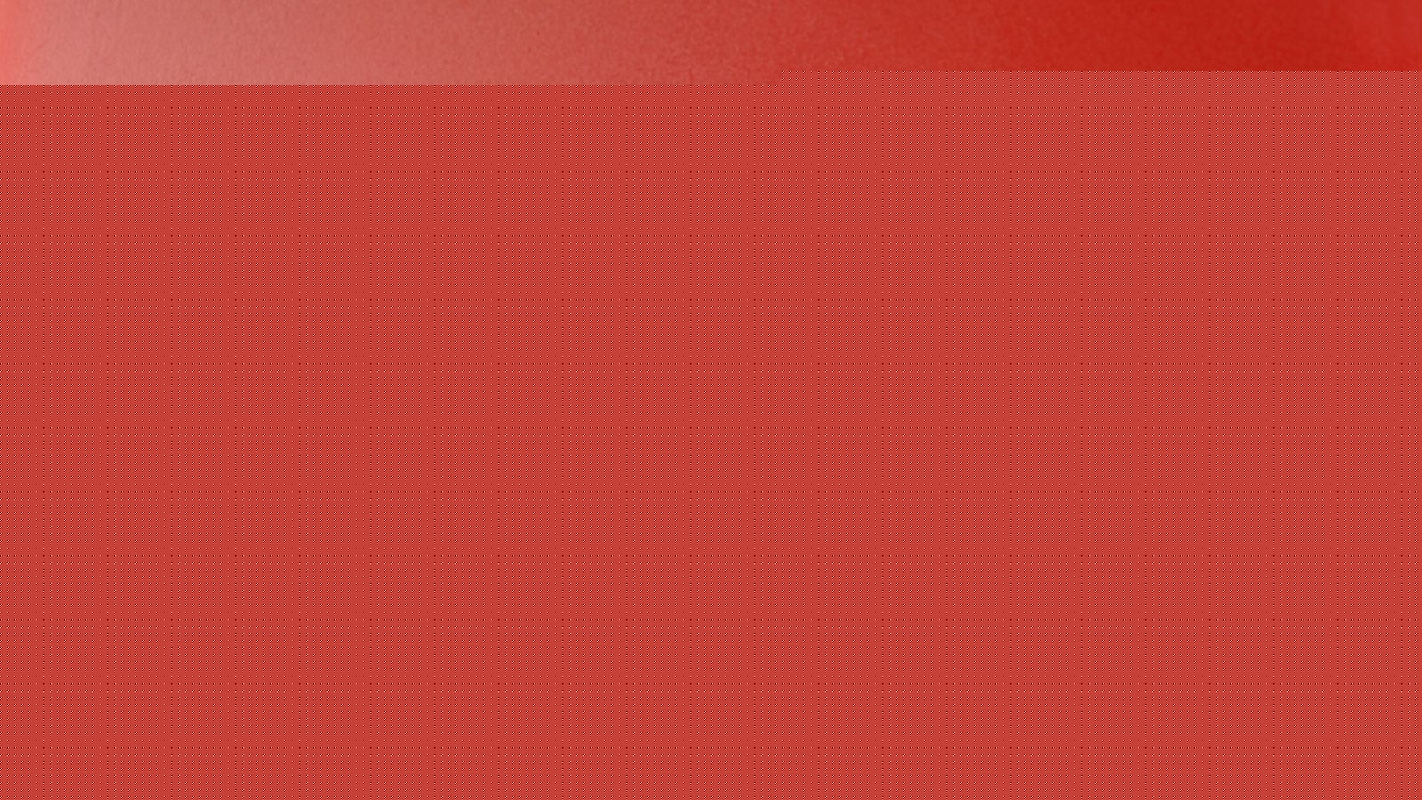 Fresh red jalapeno pepper with cilantro leaves on red background