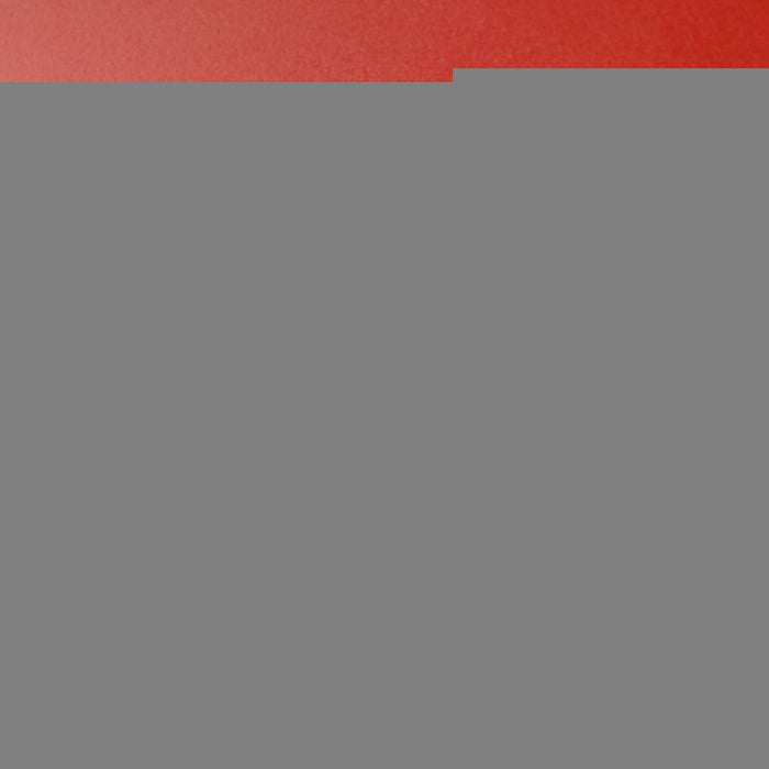 Fresh red jalapeno pepper with cilantro leaves on red background