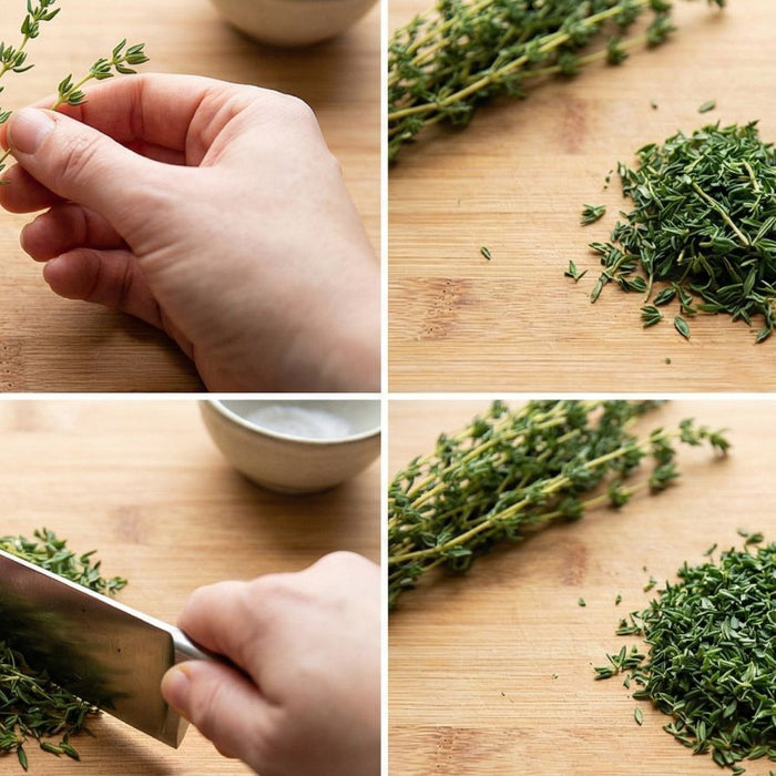 Hands stripping fresh thyme leaves from stems on wooden board