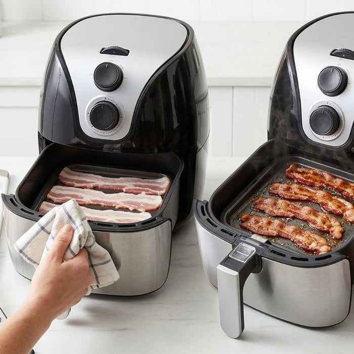 Crispy bacon cooking in air fryer on countertop