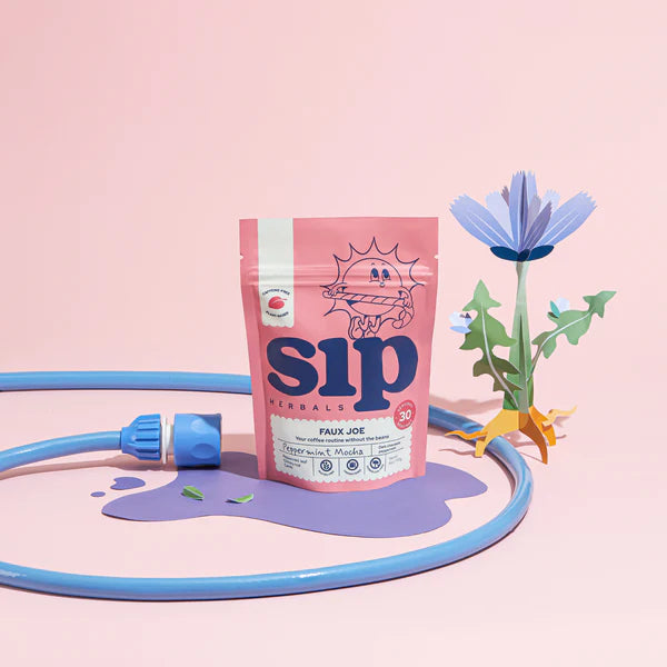 Sip Herbals Peppermint Mocha Coffee Paleo Coffee with flower and hose.